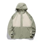 ĠAKKETT TA’ WINDBREAKER AĦDAR TAL-PIŻELLA